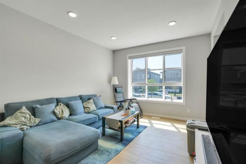 152 Belmont Way Sw, Calgary, AB - Indoor Photo Showing Living Room