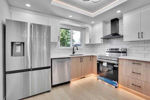 244 Huntridge Road Ne, Calgary, AB - Indoor Photo Showing Kitchen With Upgraded Kitchen