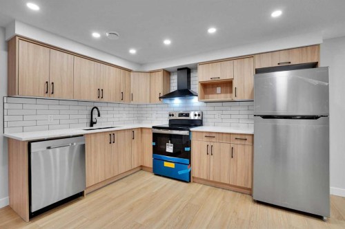 244 Huntridge Road Ne, Calgary, AB - Indoor Photo Showing Kitchen With Upgraded Kitchen