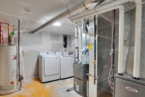 244 Huntridge Road Ne, Calgary, AB - Indoor Photo Showing Laundry Room