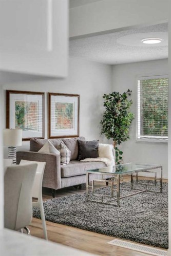 27 Dovercrest Way Se, Calgary, AB - Indoor Photo Showing Living Room