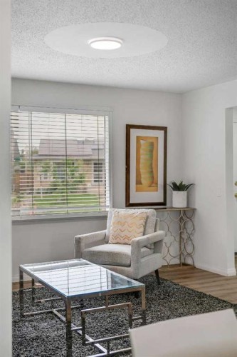 27 Dovercrest Way Se, Calgary, AB - Indoor Photo Showing Living Room