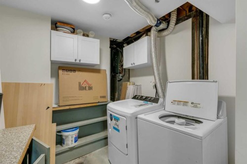 27 Dovercrest Way Se, Calgary, AB - Indoor Photo Showing Laundry Room