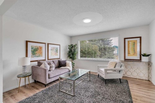27 Dovercrest Way Se, Calgary, AB - Indoor Photo Showing Living Room
