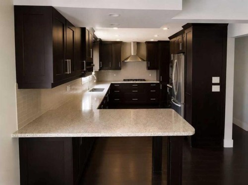 7331 Keewatin Street Sw, Calgary, AB - Indoor Photo Showing Kitchen With Double Sink