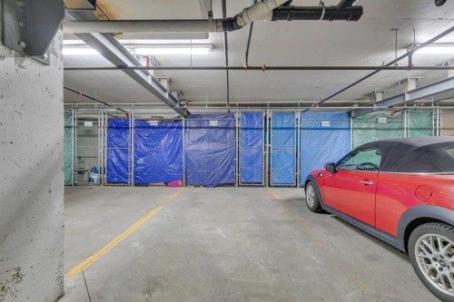 3238-1818 Simcoe Boulevard Sw, Calgary, AB - Indoor Photo Showing Garage