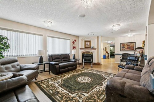 3238-1818 Simcoe Boulevard Sw, Calgary, AB - Indoor Photo Showing Living Room
