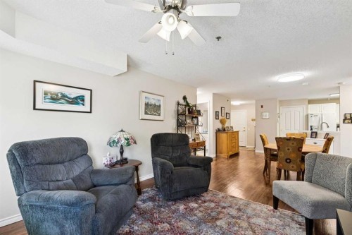 3238-1818 Simcoe Boulevard Sw, Calgary, AB - Indoor Photo Showing Living Room