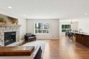 36 Cranwell Green Se, Calgary, AB  - Indoor Photo Showing Living Room With Fireplace 