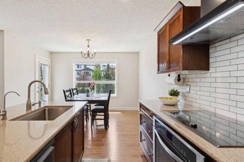 36 Cranwell Green Se, Calgary, AB - Indoor Photo Showing Kitchen With Upgraded Kitchen