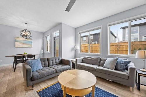 338 Magnolia Way Se, Calgary, AB - Indoor Photo Showing Living Room