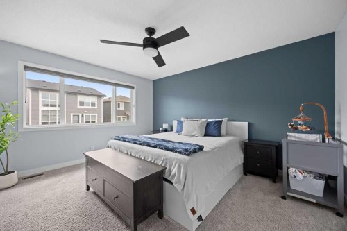 338 Magnolia Way Se, Calgary, AB - Indoor Photo Showing Bedroom