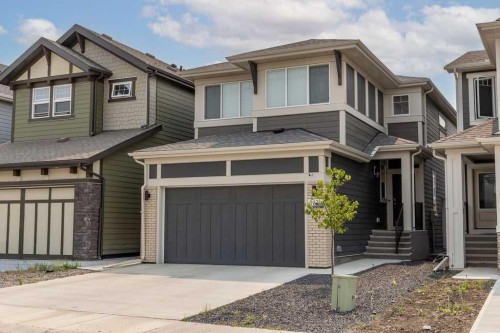 338 Magnolia Way Se, Calgary, AB - Outdoor With Facade