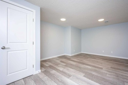 338 Magnolia Way Se, Calgary, AB - Indoor Photo Showing Other Room