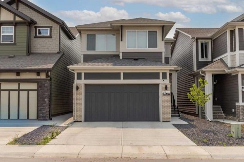 338 Magnolia Way Se, Calgary, AB - Outdoor With Facade