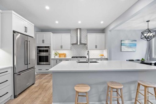 338 Magnolia Way Se, Calgary, AB - Indoor Photo Showing Kitchen With Upgraded Kitchen