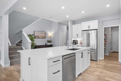 338 Magnolia Way Se, Calgary, AB - Indoor Photo Showing Kitchen With Upgraded Kitchen