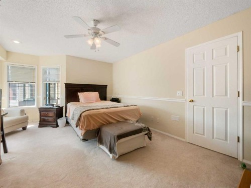 81 Prominence View Sw, Calgary, AB - Indoor Photo Showing Bedroom