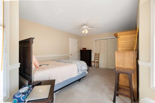 81 Prominence View Sw, Calgary, AB - Indoor Photo Showing Bedroom