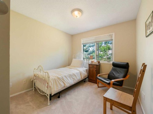 81 Prominence View Sw, Calgary, AB - Indoor Photo Showing Bedroom