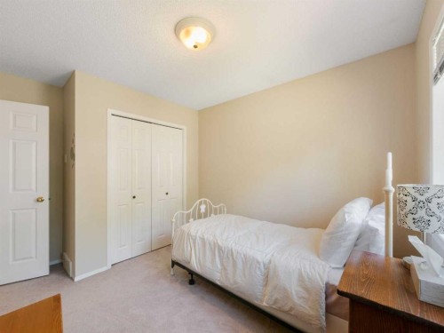 81 Prominence View Sw, Calgary, AB - Indoor Photo Showing Bedroom