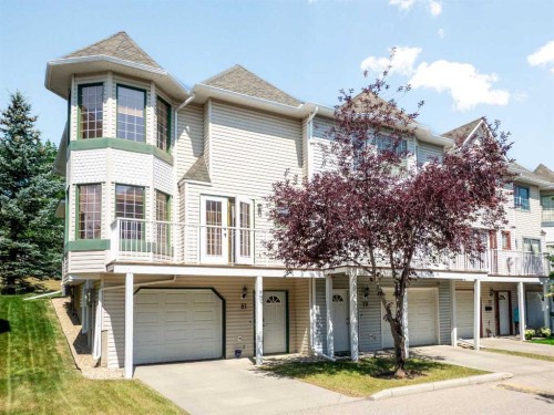 81 Prominence View Sw, Calgary, AB - Outdoor With Deck Patio Veranda With Facade