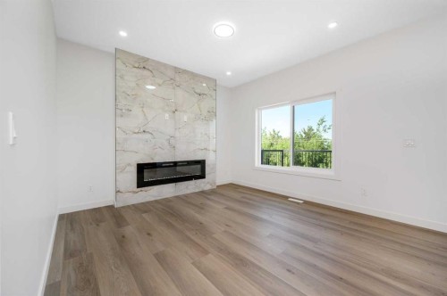 182 Lakewood Crescent, Strathmore, AB - Indoor Photo Showing Living Room With Fireplace