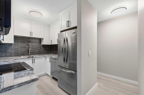 34-420 Grier Avenue Ne, Calgary, AB - Indoor Photo Showing Kitchen With Stainless Steel Kitchen With Upgraded Kitchen