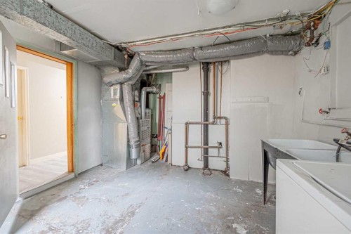 1506 36 Street Se, Calgary, AB - Indoor Photo Showing Laundry Room