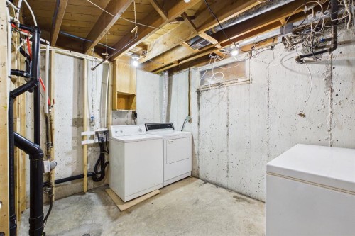 83 Westover Drive Sw, Calgary, AB - Indoor Photo Showing Laundry Room
