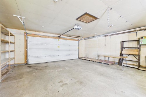 83 Westover Drive Sw, Calgary, AB - Indoor Photo Showing Garage
