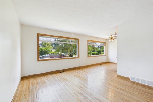 83 Westover Drive Sw, Calgary, AB - Indoor Photo Showing Living Room