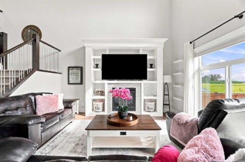 114 Kinniburgh Road, Chestermere, AB - Indoor Photo Showing Living Room