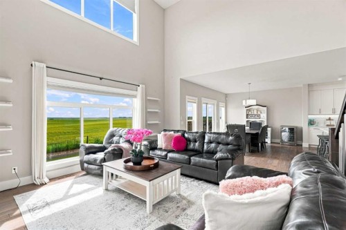 114 Kinniburgh Road, Chestermere, AB - Indoor Photo Showing Living Room
