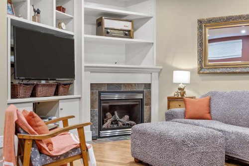 301 29 Avenue Ne, Calgary, AB - Indoor Photo Showing Other Room With Fireplace
