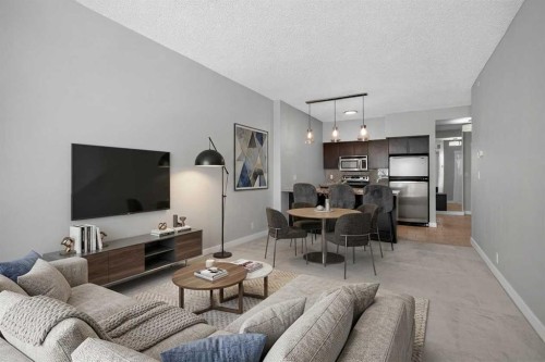 1205-8710 Horton Road Sw, Calgary, AB - Indoor Photo Showing Living Room