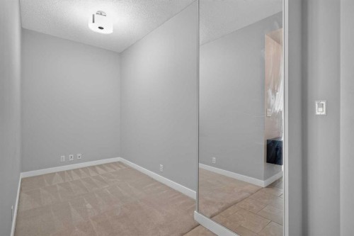 1205-8710 Horton Road Sw, Calgary, AB - Indoor Photo Showing Other Room