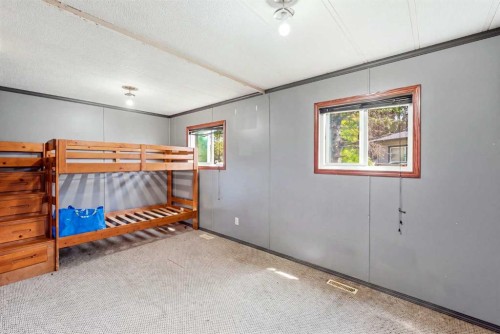 129 Big Hill Place Se, Airdrie, AB - Indoor Photo Showing Bedroom