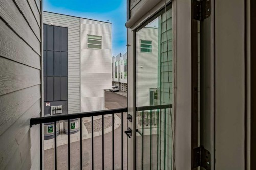 202-101 Panatella Square Nw, Calgary, AB -  With Exterior
