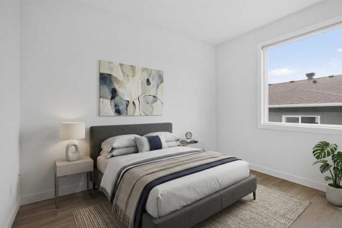 202-101 Panatella Square Nw, Calgary, AB - Indoor Photo Showing Bedroom