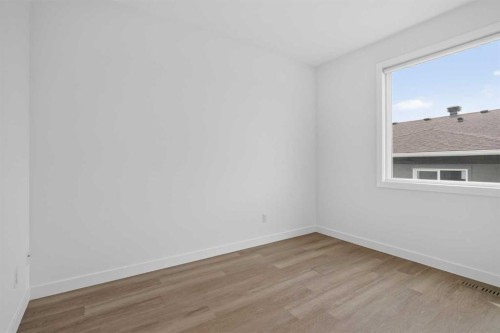 202-101 Panatella Square Nw, Calgary, AB - Indoor Photo Showing Other Room