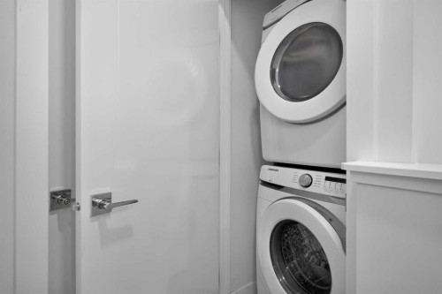 202-101 Panatella Square Nw, Calgary, AB - Indoor Photo Showing Laundry Room