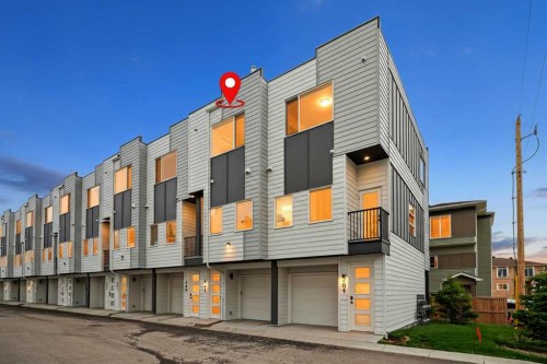 202-101 Panatella Square Nw, Calgary, AB - Outdoor With Facade