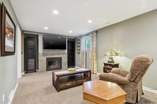 6111 Bow Crescent Nw, Calgary, AB - Indoor Photo Showing Other Room With Fireplace