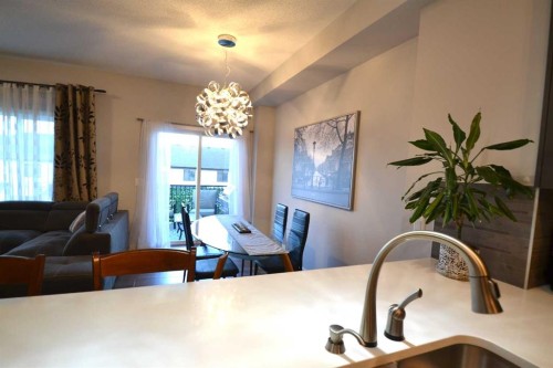 613 Hillcrest Road Sw, Airdrie, AB - Indoor Photo Showing Dining Room