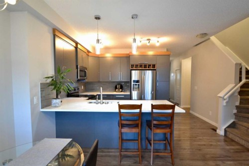 613 Hillcrest Road Sw, Airdrie, AB - Indoor Photo Showing Kitchen