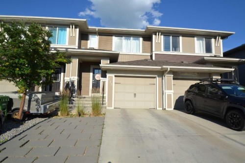 613 Hillcrest Road Sw, Airdrie, AB - Outdoor With Facade