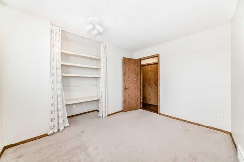 16 Edenwold Green Nw, Calgary, AB - Indoor Photo Showing Other Room