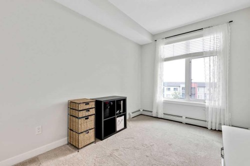 2310-3727 Sage Hill Drive Nw, Calgary, AB - Indoor Photo Showing Other Room
