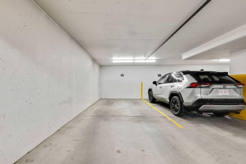 2310-3727 Sage Hill Drive Nw, Calgary, AB - Indoor Photo Showing Garage